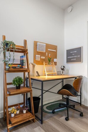 Work or relax in the dedicated office area, complete with a charging dock and super-fast Optic Fibre Wi-Fi, perfect for remote work, streaming, or staying connected during your stay.
