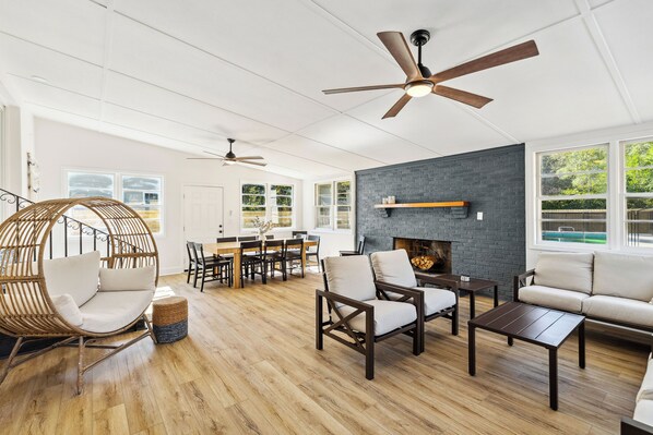 Spacious heated and cooled sunroom area with cozy furnishings!