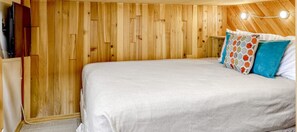Queen private bedroom w/ Roku TV. Leading to back porch (not private). Chairs are provided.