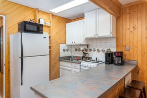 Full kitchen. Ice maker not working. Ice trays provided.