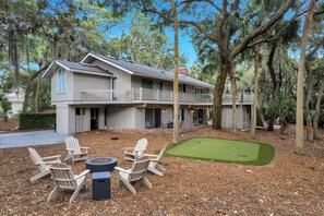 Spend the day on the backyard putting green and wind down under the stars around the fire pit.