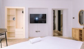 Unwind in this beautifully designed room with a large TV for relaxation.