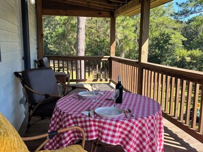 Porch with gas grill and a peaceful view
