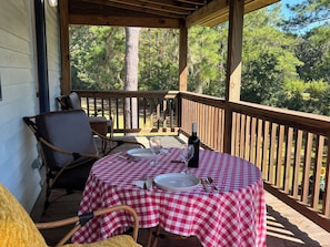 Porch with gas grill and a peaceful view