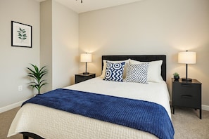 Cozy Bedroom – King Bed, Plush Linens, and Elegant Decor for a Relaxing Stay
