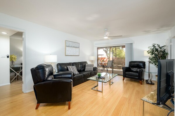 Large living room with leather furniture