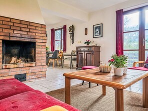 Furniture, Flooring, Interior Design, Wood, Floor, Living Room, Chair, Ceiling, Couch, Table
