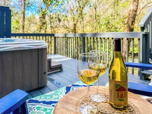 Unwind in the hot tub with a glass of local wine, listening to the soothing waterfall sounds of the creek after a day of hiking and adventure