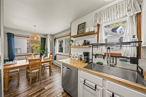 Dining area and FULLY STOCKED kitchen 
