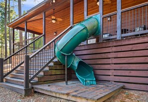 The kids will love this outdoor play area with swings and a slide. It’s the perfect way to burn off some energy while the adults enjoy some quiet time or join in the fun.