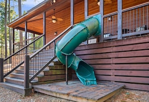 The kids will love this outdoor play area with swings and a slide. It’s the perfect way to burn off some energy while the adults enjoy some quiet time or join in the fun.