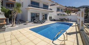 An Exterior Front Of Atlantic Sunset Villa In Madeira By Ourmadeira