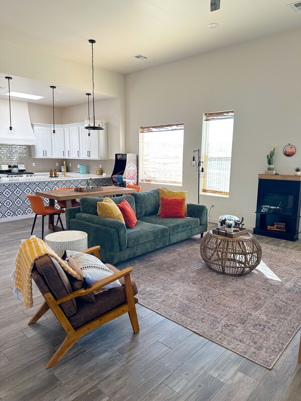 Kick back and relax in the extra-deep couch and unwind by the electric fireplace