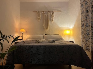 Double bed in Casa Iguana apartment at Finca Oaxaca.