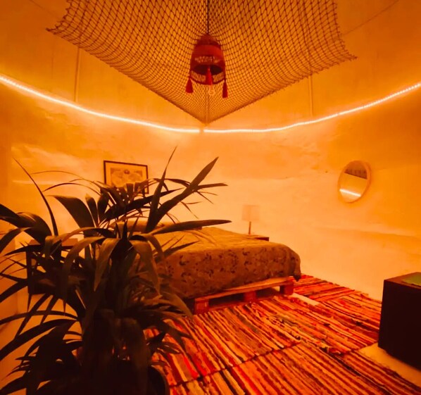 Ground floor bed in the Casa Quatzal dome house at Finca Oaxaca.