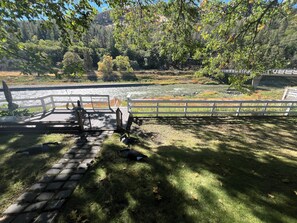 Watch the river run from your private deck. 