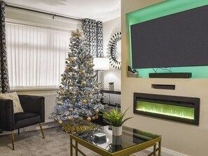 Living room decorated for Christmas | Wharfdale Lodge, Thornton-Cleveleys, near Blackpool
