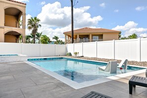 Relax, unwind, and soak in the sun by the pool.