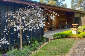 Grand View Villa exterior with blossom