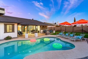 Evenings made perfect—enjoy twilight swims and patio dining in your private backyard retreat!