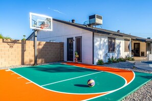 Bring your A-game! Enjoy endless hours of fun on our backyard basketball court.