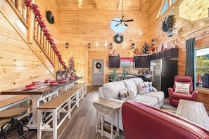 Large communal living room with full kitchen