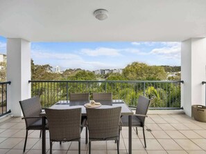Step out onto the balcony and savor the breathtaking outdoor views. With ample seating for six, it's the perfect spot to enjoy delightful meals amidst the refreshing breeze. 