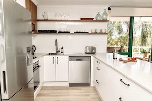 Whip up meals in the fully equipped kitchen, or take a short stroll to nearby cafes and restaurants for a delicious bite.