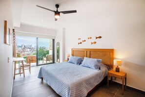 The master bedroom offers a comfortable king size bed