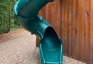 Zoom down the twisty slide for outdoor excitement everyone will love!