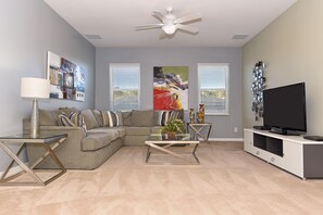Relax in this bright and spacious sitting area, perfect for unwinding after a long day.