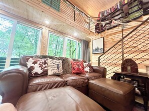 This all wood cabin has such a cozy vibe, you won't want to leave. 