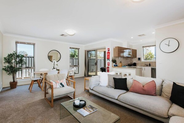 An open plan living, dining and kitchen area is ideal for entertaining.