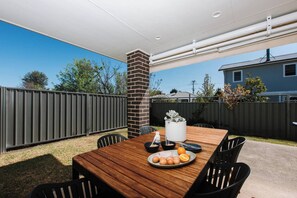 Dine alfresco on the undercover patio.