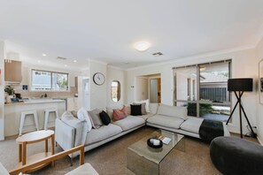 Spread out on the comfortable modular lounge in the living area, with heating and cooling to keep you comfortable year round.
