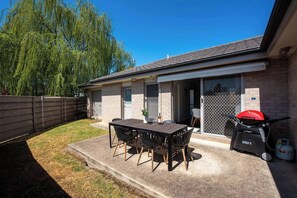 A patio offers additional dining space, with a BBQ for afternoon cook ups with the family.