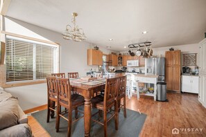 Enjoy the open space of our dining and kitchen area, designed for both functionality and comfort.