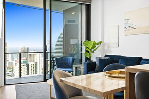 Dining area is right next to the balcony overlooking the city and the ocean