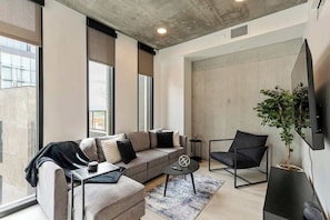 Living room with 65" smart TV