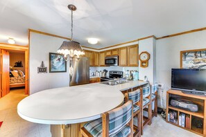 Kitchen | Single-Story Townhome | Wood-Burning Fireplace
