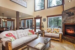 Beautiful Living Room with Large Windows overlooking the meadows