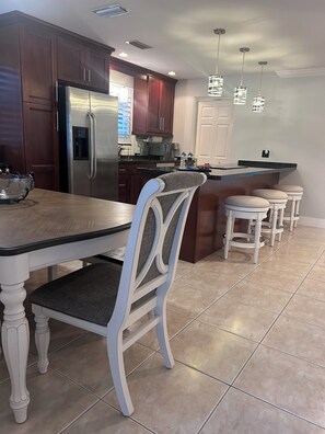 Well, appointed kitchen and dining area