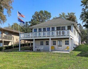 View of home from the lake. Patio with sitting area.