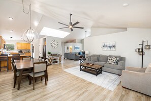 Spacious Luxury: This 2,750 sq. ft. single-level home boasts an open-concept design with soaring ceilings, offering plenty of room for up to 10 guests to relax and connect.