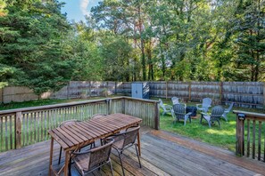 Outdoor seating and particially fenced in yard