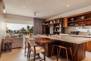 Experience seamless indoor-outdoor living in this beautifully designed space, featuring stylish décor and breathtaking ocean views.