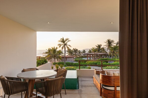 Take a refreshing dip in your private plunge pool while soaking in the serenity of the beach just steps away.