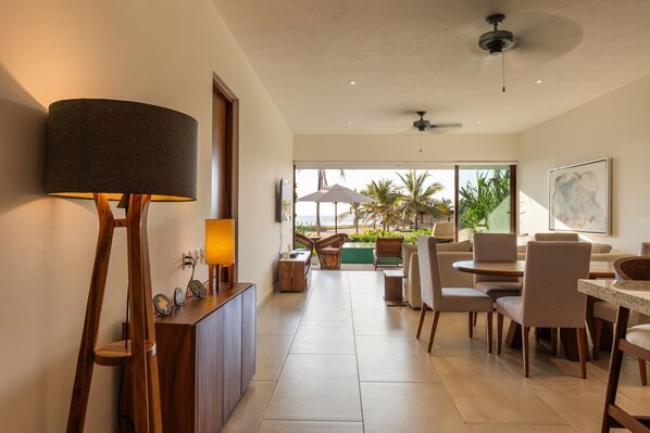 Experience open-air dining and relaxation with stunning ocean views, cozy seating, and modern decor.