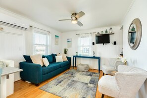 Kick back on the comfy furniture in the living area, games included!