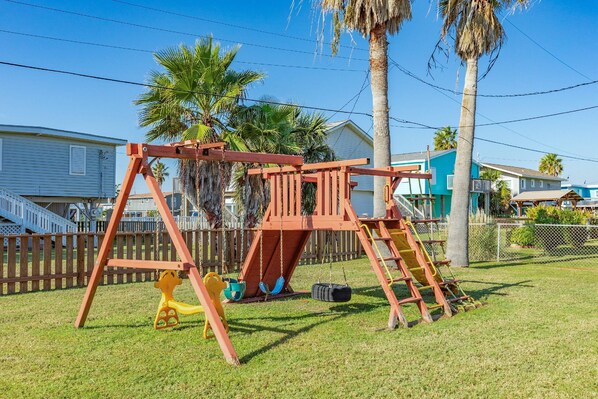Playset for the kids in the fully fenced yard